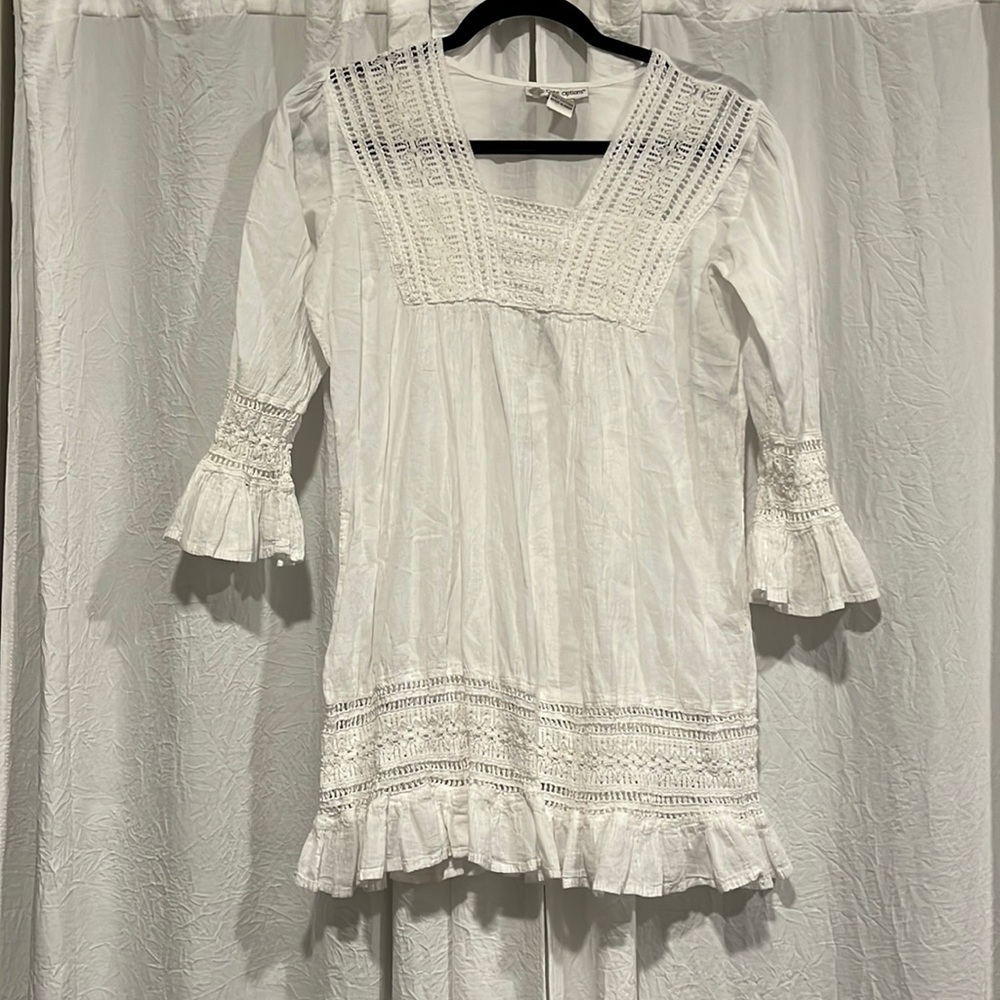 White swimsuit cover
